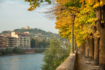 View of the Adige in central Verona with the Santuario Madonna di Lourdes on the hilltop.