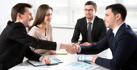 Business people shaking hands