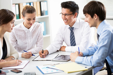 Businessman tells his colleagues about a new project