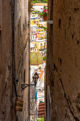 Italy, Positano, view of the city between two buildings