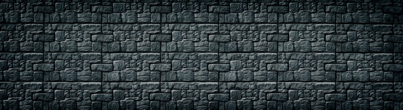 Black patterned tile wall wide texture. Dark masonry long backdrop. Gloomy gothic background