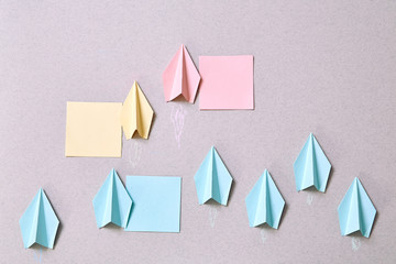 Business organization hierarchy and structure: Paper planes and stickers for inscriptions....