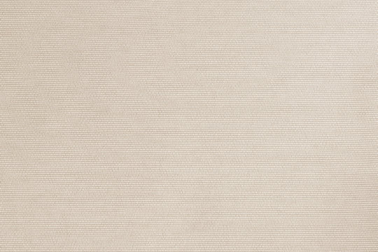 Cotton silk fabric wallpaper texture pattern background in light pastel sepia cream brown color tone