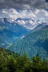 Fototapeta na wymiar Spectacular view of snowy Kackar Mountains at the beginning of summer season. Photo taken at the 