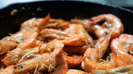 close up on fried shrimps on grill