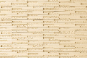 Granite tile wall pattern texture background in light yellow cream beige color..