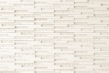 Granite tiled wall detailed pattern texture background in natural light creme beige color.
