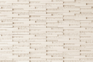 Granite tiled wall detailed pattern texture background in natural light creme beige color.