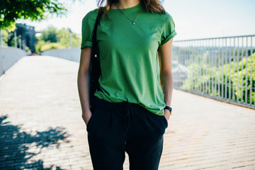 Young woman in a green T-shirt