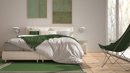 Modern green colored minimalist bedroom, bed with pillows and blankets, parquet, bedside tables and carpet. Panoramic window with winter panorama with trees and snow, interior design