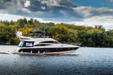 Fototapeta na wymiar Luxury yacht on a river.