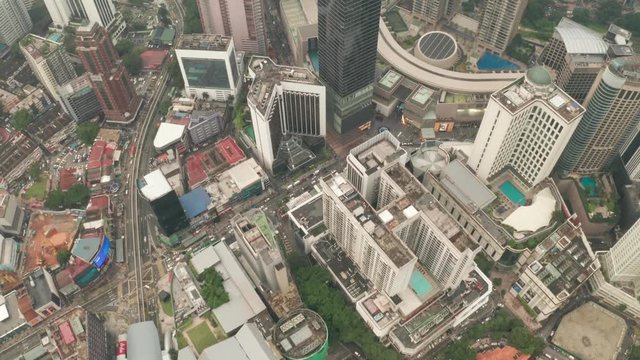 Aerial drone top view of Kuala Lumpur city traffic and buildings, Malaysia