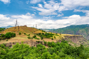 Debed River canyon in Armenia with transmission towers at the top.