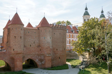 Fototapeta na wymiar The Barbican and City Walls in Old Town of Warsaw, Poland