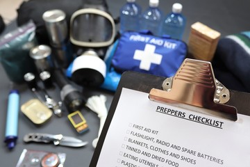 Clipboard checklist.Preppers are know for preparing for natural disasters,economic collapse,civil...