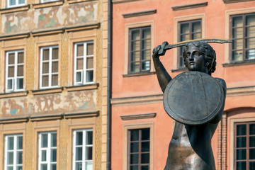 The Mermaid of Warsaw, monument of Syrena, symbol of Warsaw at Old Town Market Square, Poland © nomadkate