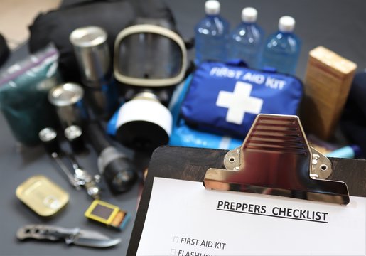 Clipboard checklist.Preppers are know for preparing for natural disasters,economic collapse,civil unrest or any doomsday scenario Such items would include food,water,lighting,shelter,and first aid kit