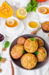 spiced pumpkin muffins with walnuts and cranberries