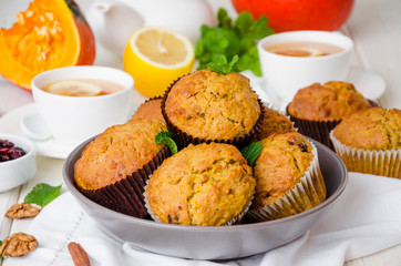 spiced pumpkin muffins with walnuts and cranberries