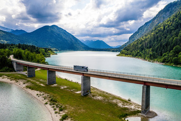 Sylvenstein Lake Bavaria Germany. Bridge for cars over water. Aerial View
