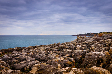 rocks on the seashore on a cludy day 