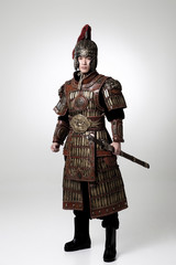 Obraz premium Adult male wearing very old armor.