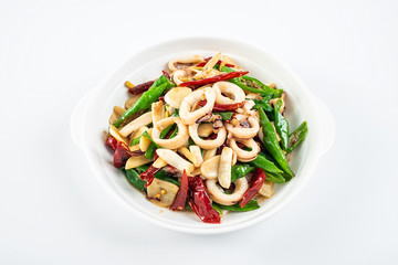 Chinese national dish, a plate of green pepper fried red shrimps on a white background