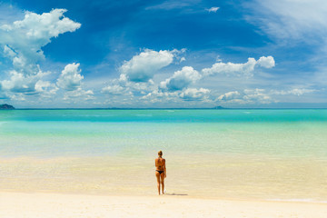 woman sunbathing  on the tropical beach