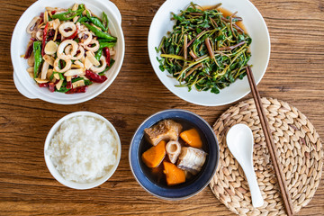 a table of national dishes on a wooden table