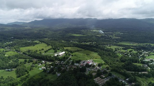 4K aerial establishing shot of the mountains outside of Stowe, Vermont