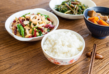 a table of national dishes on a wooden table