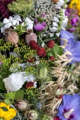 Floristic bouquet of flowers, herbs and fruits that are the symbol of summer