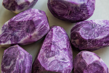 Fototapeta premium close up on Vitelotte blue-violet potato