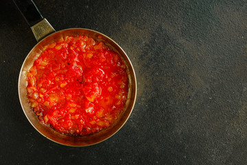 tomato sauce, skinless tomatoes - red and ripe fruits chopped, concept. food background. copy space