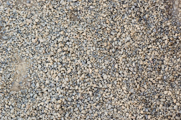 Gray and small stones background textured 