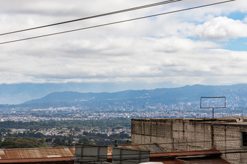 GUATEMALA CITY, GUATEMALA - December 23, 2018:  A Panoramic view of Guatemala City on the road from Antigua.