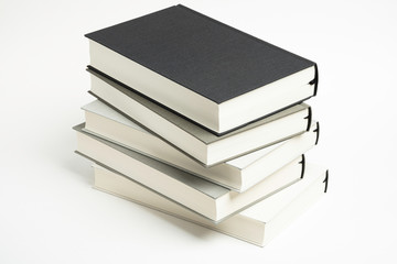 A Disarrayed Stack OF Cloth Bound Books