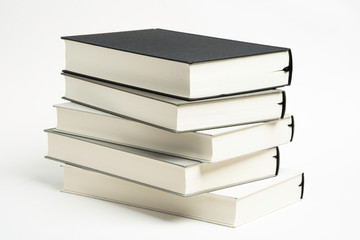 A Disarrayed Stack OF Cloth Bound Books