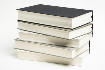 A Disarrayed Stack OF Cloth Bound Books