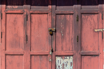 Red wood door,close and lock by key