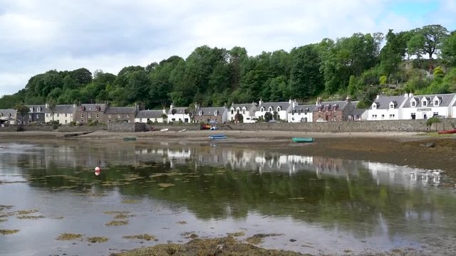 Idyllic view of Plockton, village in the Highlands of Scotland in the county of Ross and Cromarty.