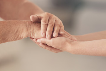 Fototapeta premium People, care and support. Giving helping hand concept