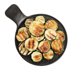 Slate plate of delicious grilled zucchini slices on white background, top view