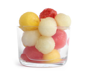 Glass of melon and watermelon balls on white background