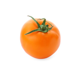 Delicious ripe orange tomato on white background