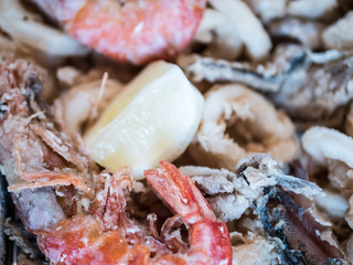 Typical Italian dish, mixed fried fresh fish with squid rings, sardines and shrimp