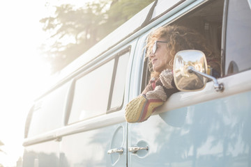 traveler lady in vacation and oudoor leisure activity - cheerful people adult oman smile. and enjoy the trip  - travelling the world in a van and live happy