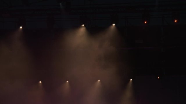 Stroboscopes, lights and smoke over a concert stage