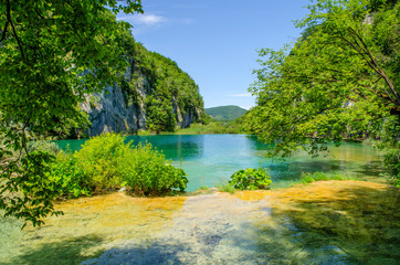Crystal water of Plitvice Lakes. Landscapes and waterfalls.