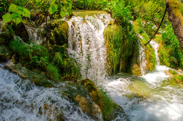 Fototapeta na wymiar Crystal water of Plitvice Lakes. Landscapes and waterfalls.